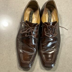 Size 11 gorgeous Mezlan dark brown laced dress shoes. Heels have been replaced